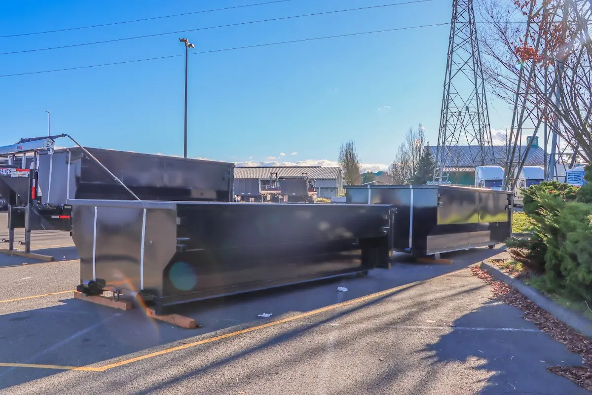 Roll-off dumpster ready for waste disposal at job site for Concrete Dumpster Rental in Moorhead